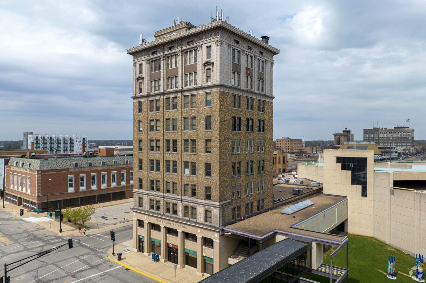The ten-story Waterloo Building rising over downtown Waterloo, Iowa, at 531 Commercial Street near the Cedar River